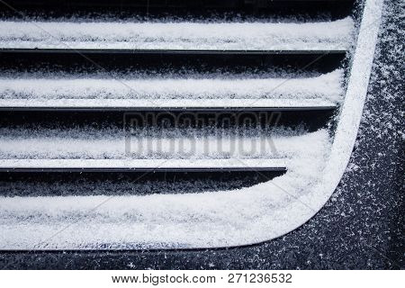 The Frozen Grille Of The Car. The Silver Grille Of The Car In The Snow