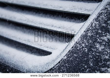 The Frozen Grille Of The Car. The Silver Grille Of The Car In The Snow