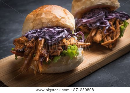 Burger with pulled pork, classic american meat sandwich