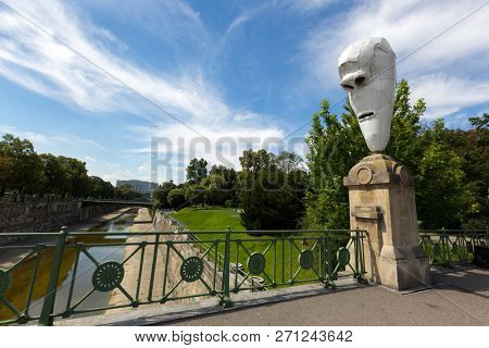 VIENNA, AUSTRIA - JULY 2018 : Lemurenkoepfe, One of the 4 Larvae, Lemur Heads by Franz West on the Stuben bridge named Stubenbruecke in Vienna, Austria on July 15, 2018 