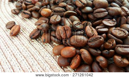 Roasted Brown Coffee Beans On Cloth Background