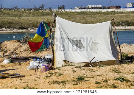The Grey Old Fashioned Patched Tourist Tent Between The Solt Firth And The Sea, Azov Sea, Ukraine, K