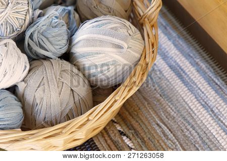 Closeup Of Basket Full Of A Blue, White And Brown Ball Of Matte Crumble