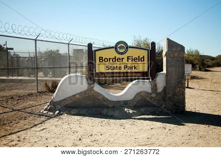 San Ysidro, California - 11/26/2018: Signs seen at the US/Mexico border. Warning, Do not cross, Directional and Location signs at the border between the USA and Mexico. Close to San Diego California.