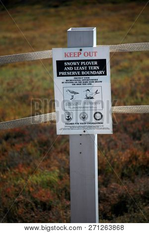 San Ysidro, California - 11/26/2018: Signs seen at the US/Mexico border. Warning, Do not cross, Directional and Location signs at the border between the USA and Mexico. Close to San Diego California.