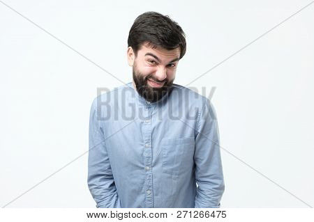 Sly Young Hispanic Man Imploring For A Favor