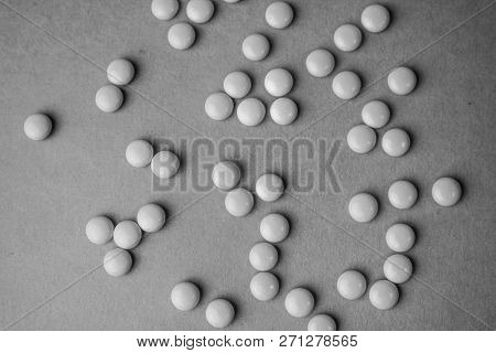 Little Beautiful Medical Pharmaceptic Round Pills, Vitamins, Drugs, Antibiotics On A Black And White