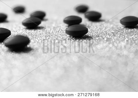 Little Beautiful Medical Pharmaceptic Round Pills, Vitamins, Drugs, Antibiotics On A Black And White