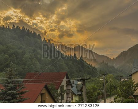 Orange Sunset With Fog After Storm In Lesnica Village In Pieniny National Park