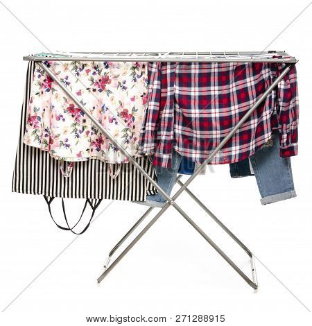 The Clothes Drying Rack With Clen Clothes On White Backgrouns Isolation