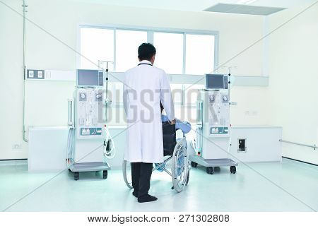 Doctors Care For Sick People With Wheelchairs In The Dialysis Room.