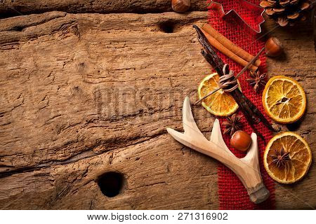 Christmas Wooden Background With Christmas Nuts Sortiment.