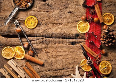 Christmas Wooden Background With Christmas Nuts Sortiment.
