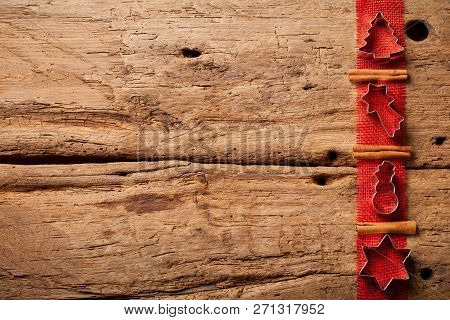 Christmas Wooden Background With Christmas Nuts Sortiment.