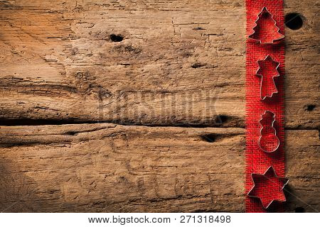 Christmas Wooden Background With Christmas Nuts Sortiment.
