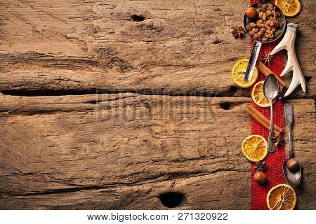 Christmas Wooden Background With Christmas Nuts Sortiment.