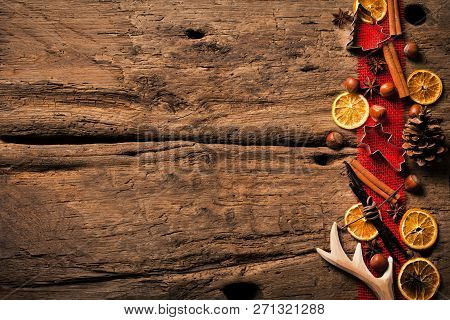 Christmas Wooden Background With Christmas Nuts Sortiment.