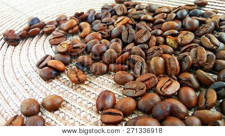 Roasted Brown Coffee Beans On Cloth Background