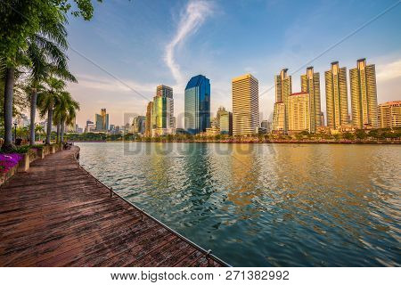 Bangkok, Thailand - March 30, 2018 : Lake Ratchada Situated In The Benjakitti Park With Modern High 