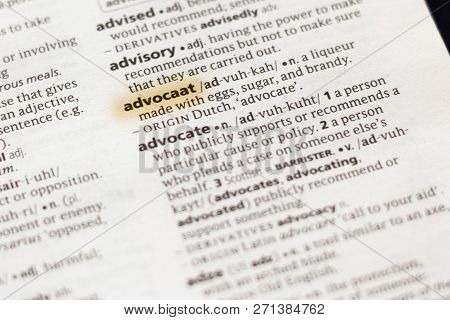 The Word Or Phrase Advocaat In A Dictionary Highlighted With Marker.