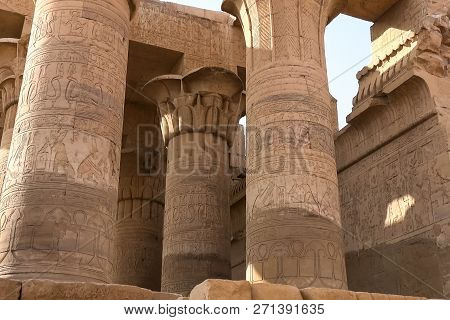 Egyptian Hieroglyphs And Drawings On The Walls And Columns. Egyptian Language, The Life Of Ancient G
