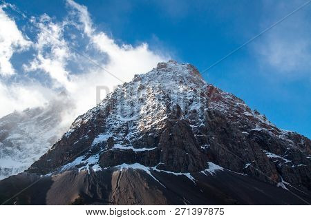 Very High Mountains In Central Asia, Tajikistan, During Drekking And Climbing