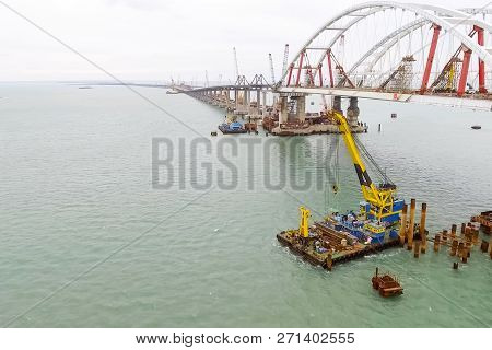 Construction Of The Bridge. Engineering Facilities For The Construction Of A Railway And Automobile 