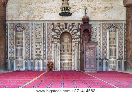 Cairo, Egypt - January 3 2018: Colorful Decorated Marble Wall With Engraved Mihrab (niche) And Woode