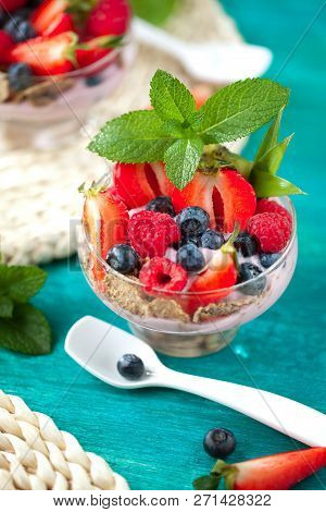 Summer Dessert With Strawberries On A Wooden Background.