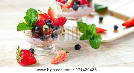 Summer Dessert With Strawberries On A Wooden Background.