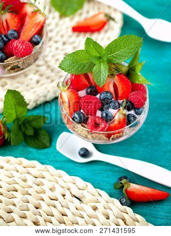 Summer Dessert With Strawberries On A Wooden Background.