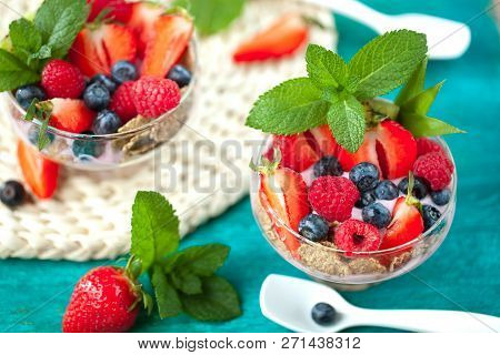 Summer Dessert With Strawberries On A Wooden Background.