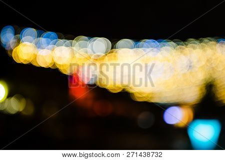 Defocused Large Multicolored Garland In Place Du Marche Gayot In Central Strasbourg During Winter Ch