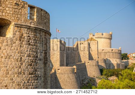 Minceta Tower And Dubrovnik Medieval Old Town City Walls At Sunset Time In Croatia
