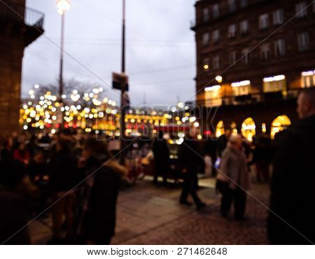 Defocused Blur View Of People Walking On Christmas Market Decorations Street In Strasbourg France