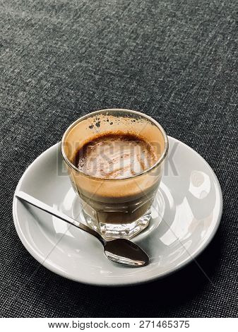 Glass Of Picolo Latte Coffee On Sofa / Cortado. Organic Beverage.