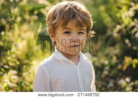 Funny Child Winking. A Kid Winking An Eye, Emoji. Happy Cute Boy. Beautiful Portrait. Expressive Fac
