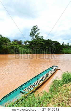 Old Wooden Boat On Riverside Nature Fishing Boat On Water Turbid River