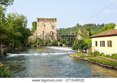 Visconti Bridge Of Valeggio Sul Mincio At Borghetto With Reflections In Mincio River, Italy