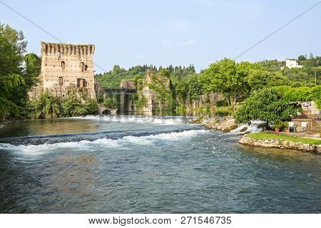 Visconti Bridge Of Valeggio Sul Mincio At Borghetto With Reflections In Mincio River, Italy