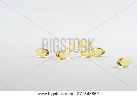 Fish Oil Omega3 Capsules Biologically Active Additive On A Light Background Close-up Side View