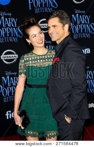 LOS ANGELES - NOV 29:  Caitlin McHugh, John Stamos at the 