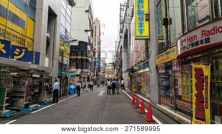 Tokyo, Japan - August 2018: Akihabara Crosswalk Junction In The Evening With Colorful Lights. Japane