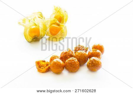 Freeze Dried And Fresh Physalis On A White Background With Shadow. Lyophilization. Food For Astronau