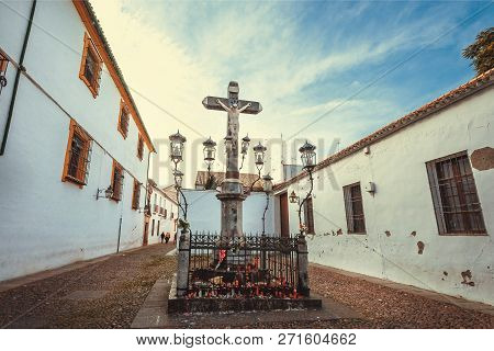 Cordoba, Spaine - Nov 17: Crucified Jesus On A Cross And Street Lights Of Historical Andalusian City