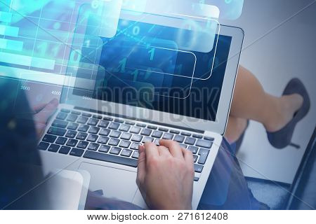 Top View Of Unrecognizable Young Businesswoman Typing On Her Laptop In Office With Double Exposure O