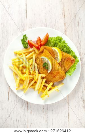 Homemade Breaded German Weiner Schnitzel With Potatoes.