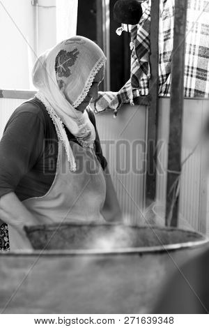 Turkish Woman Is Cooking Traditional Food In The Bazaar Of Teos - Seferihisar - Izmir (turkey), 17th