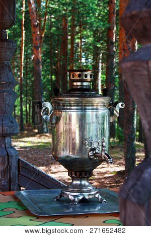 Samovar With Heating Costs On The Street. Country House.