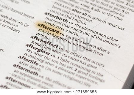 The Word Or Phrase Aftercare In A Dictionary Highlighted With Marker.